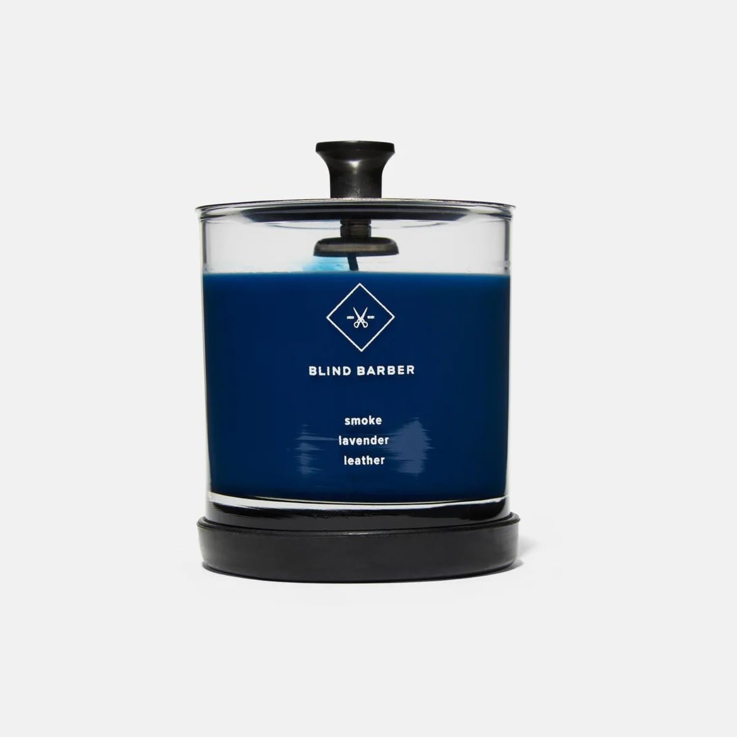 Blind Barber Tompkins hand poured candle from NYC studio signals premium quality.
