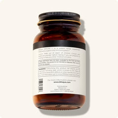 Bottle on wood surface ready for daily use with Blisque Immune +