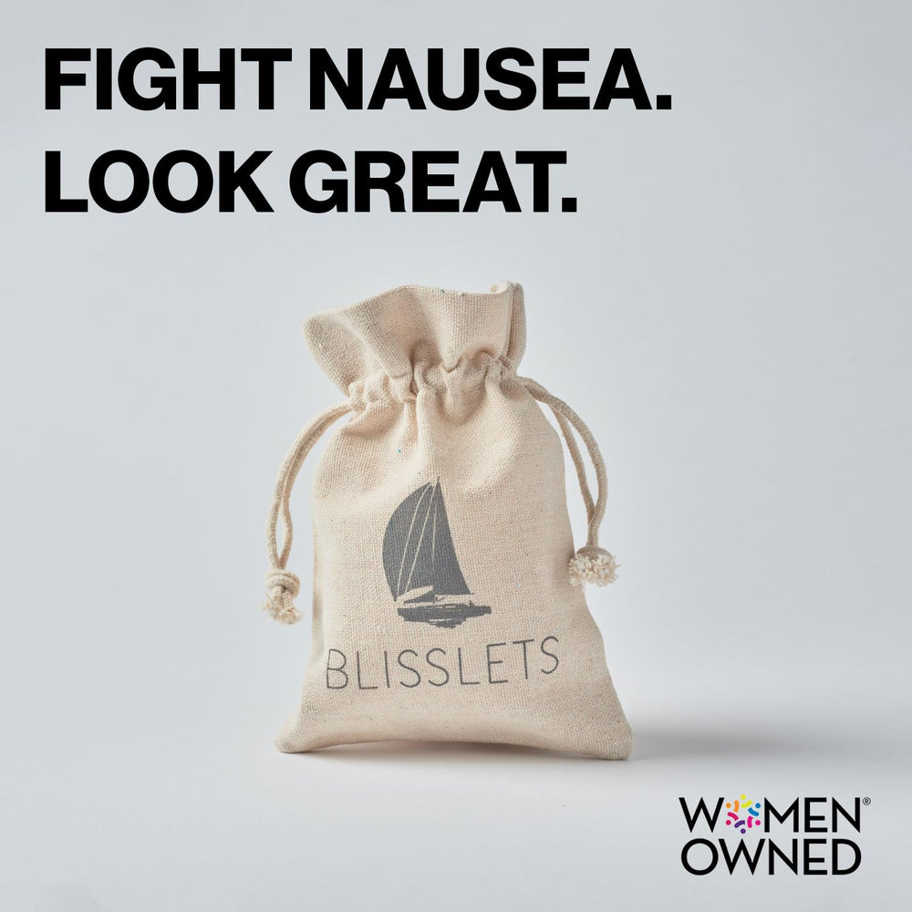 Discreet design of Blisslets band fits under cuffs during meals on a ship.