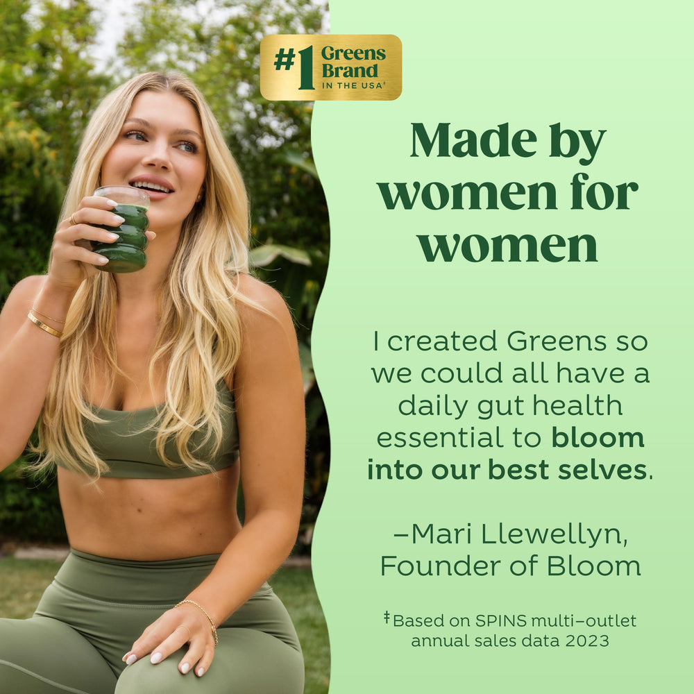 Bloom Nutrition greens powder tub with scoop for consistent daily servings.