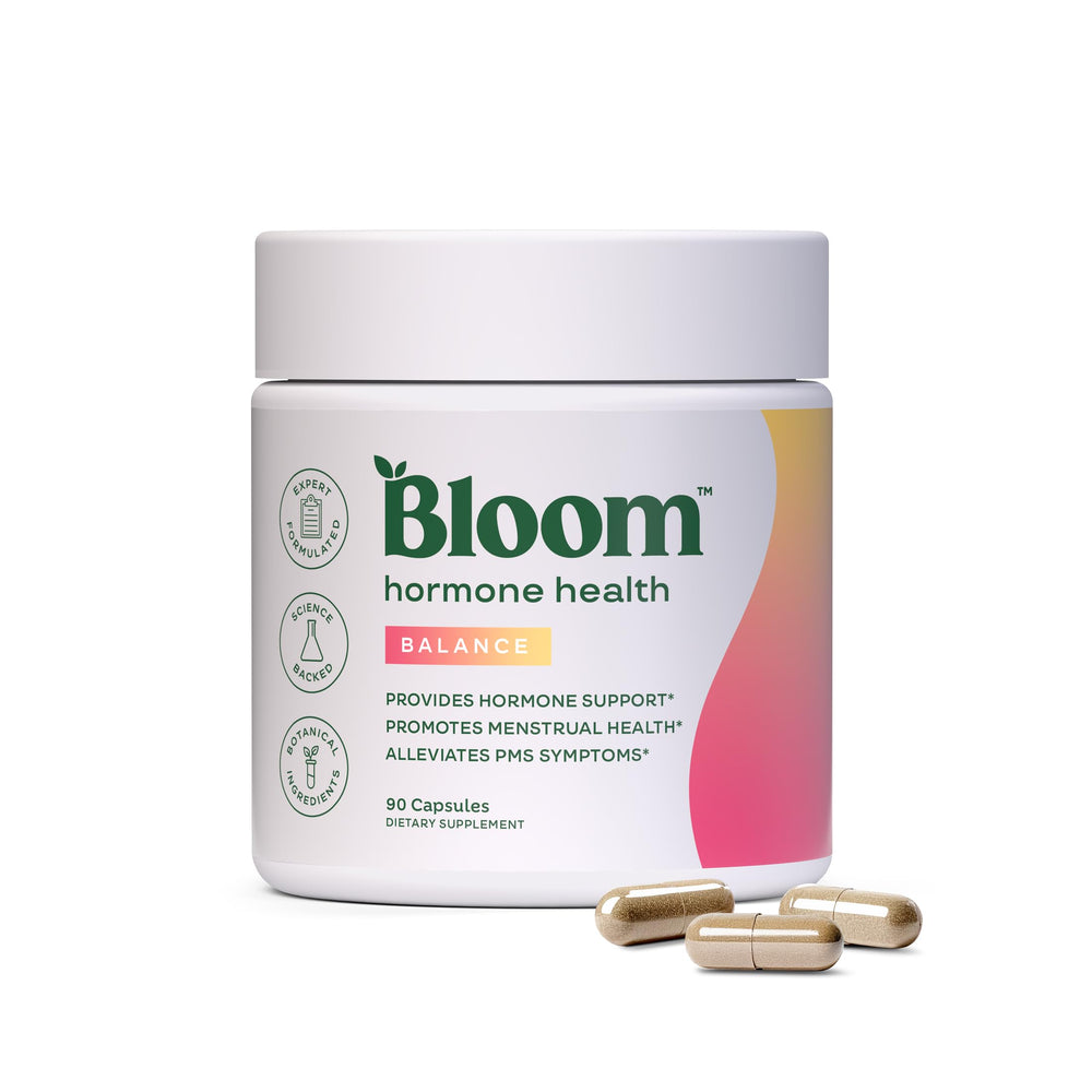 Bloom Nutrition hormone health capsules bottle pour promotes balanced hormones.