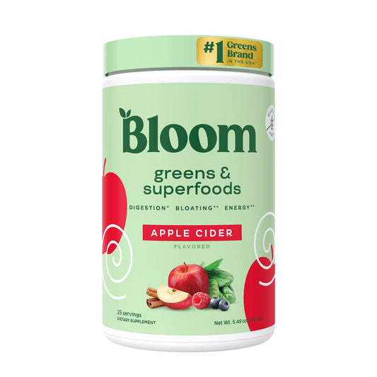Bloom Nutrition superfood greens powder in apple cider tub for daily wellness.