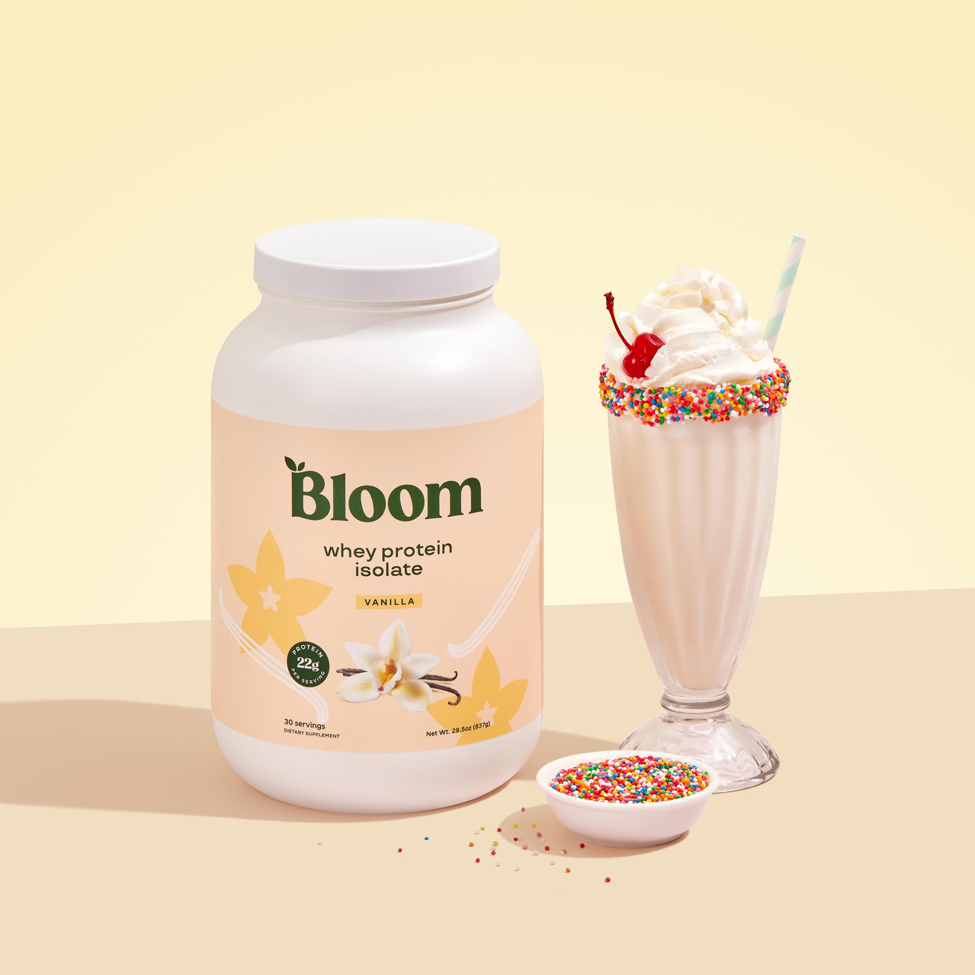 Bloom Nutrition whey isolate vanilla packaging highlights zero sugar and keto-friendly formula.
