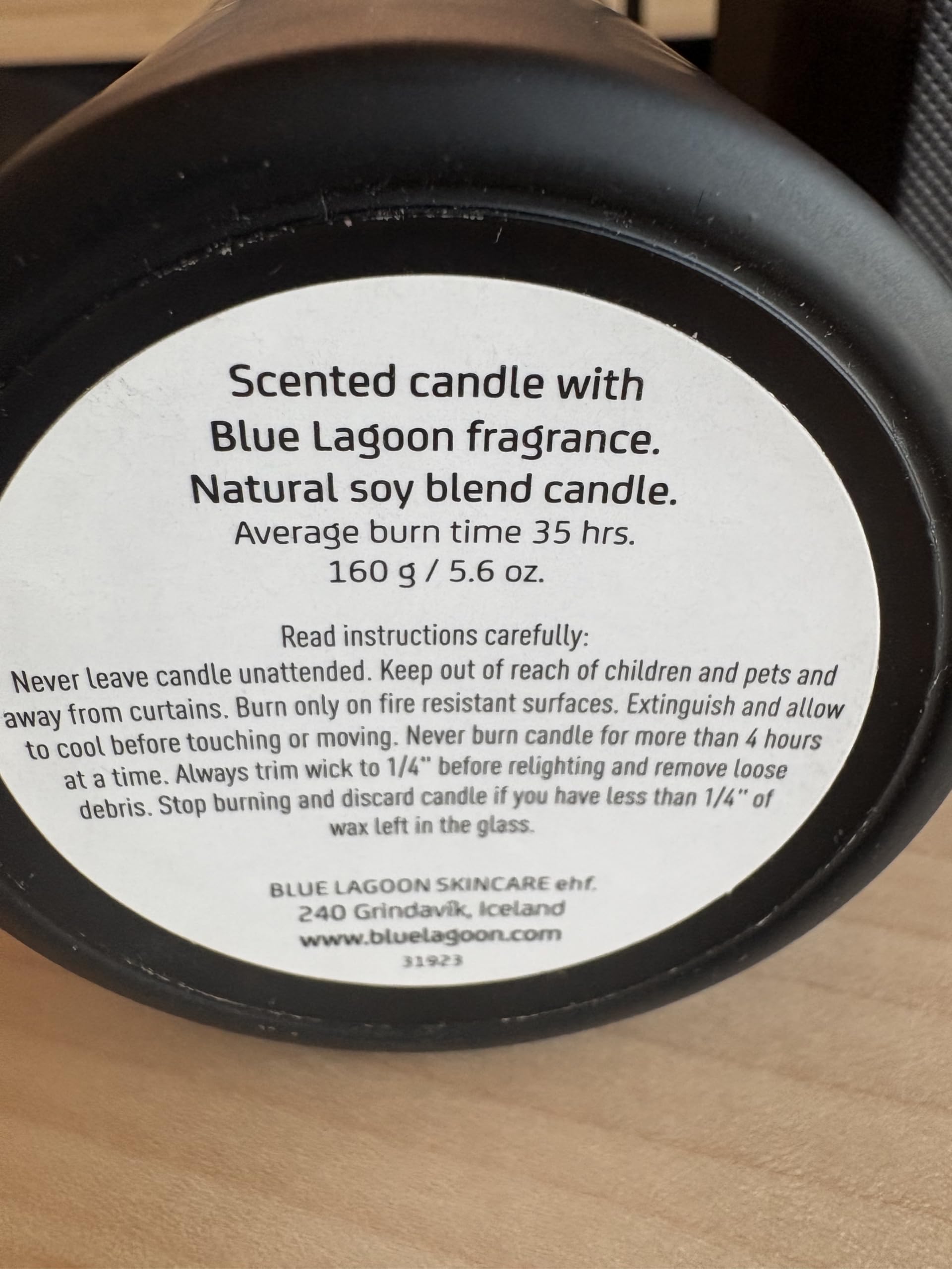 Blue Lagoon Skin Science candle close-up reveals soothing fragrance for relaxation.