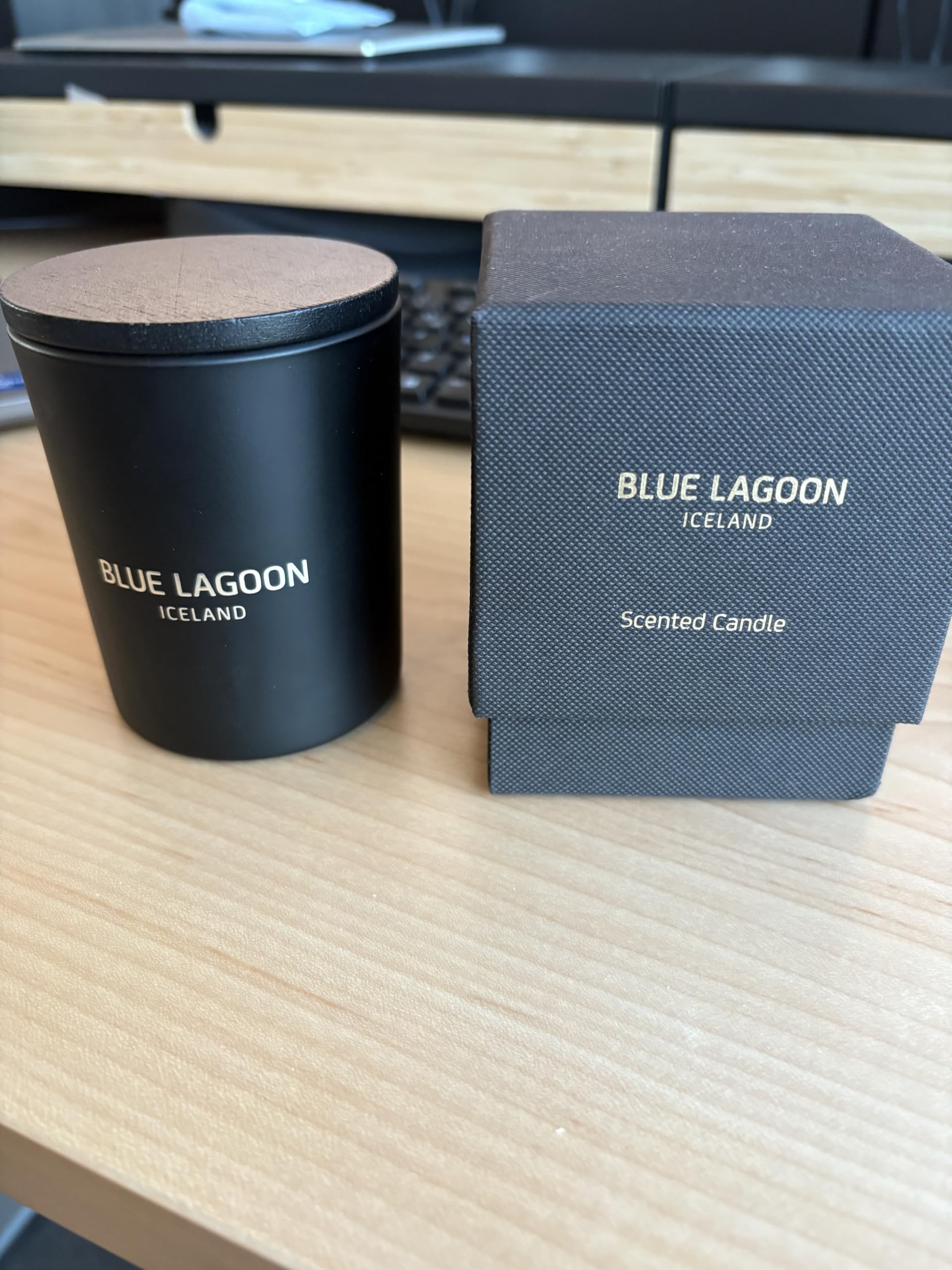 Blue Lagoon Skin Science candle lit glow creates serene home spa ambiance.