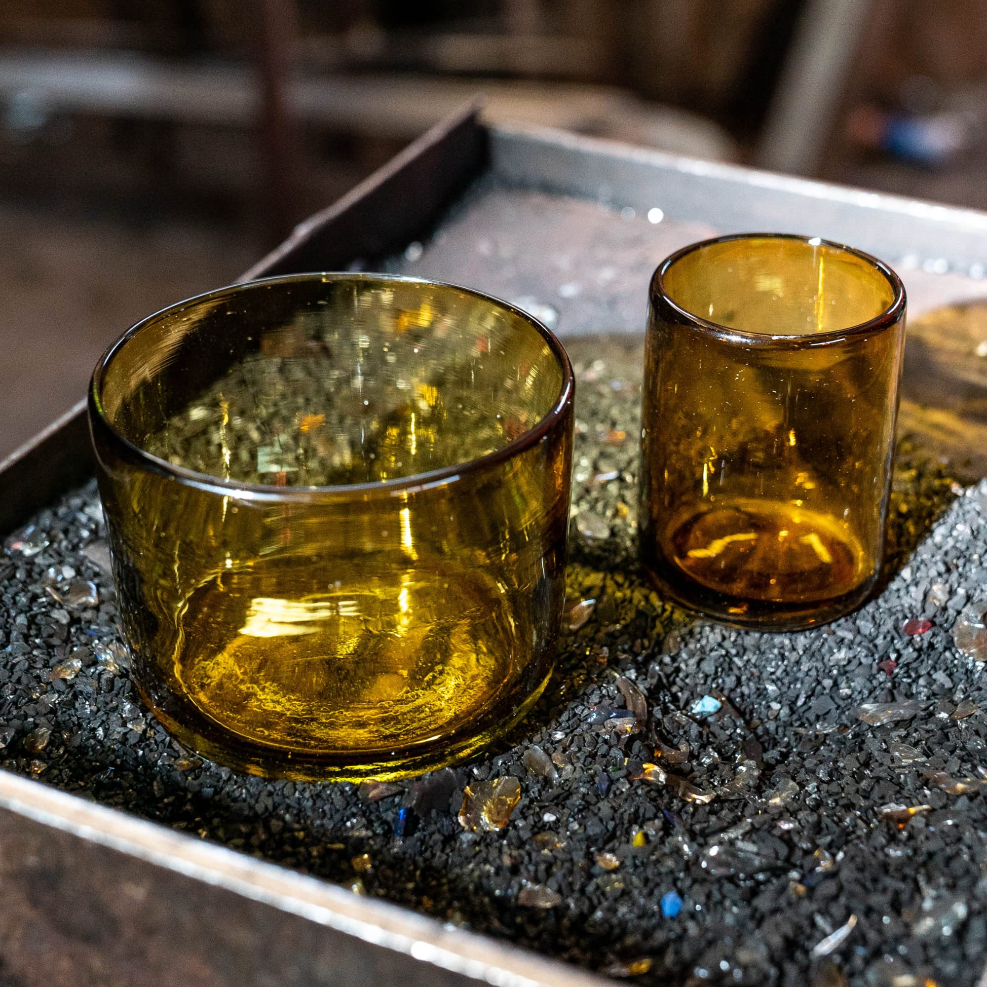 Bluecorn Beeswax amber glass vessel enhancing home decor surfaces