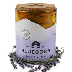 Bluecorn Beeswax candle in amber glass holder offers a warm glow for any room