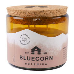 Bluecorn Beeswax large 3-wick candle with vanilla aroma in amber glass for cozy ambience.