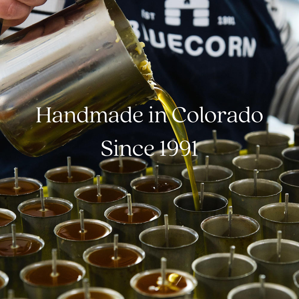 Vanilla-scented Bluecorn Beeswax candle in reusable glass jar, gift-ready.