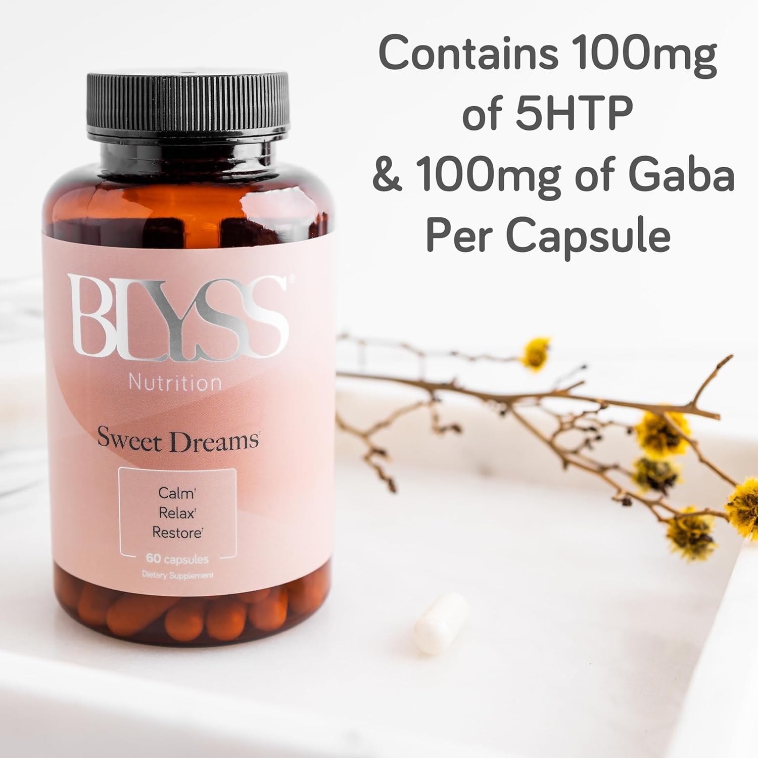 BLYSS Nutrition bottle with glass signals evening routine and calm relaxation.