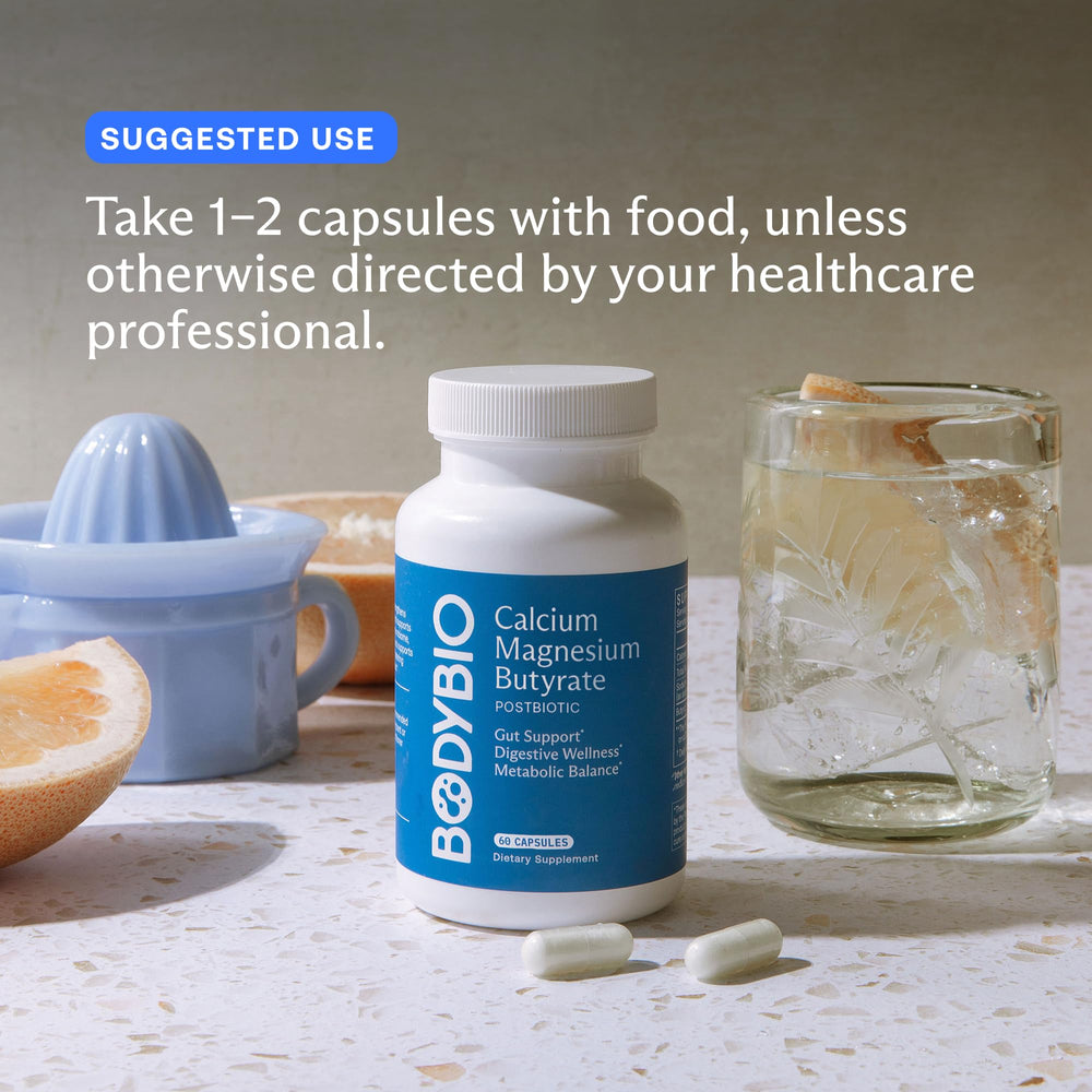 BodyBio Butyrate bottle with measuring spoon for precise daily dosing.