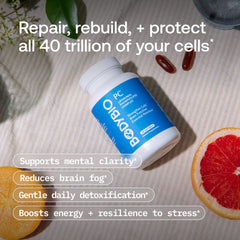 BodyBio PC dosage spoon beside bottle for convenient daily use.