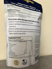 BodyBoost Kitchen scene with colostrum powder ready to blend