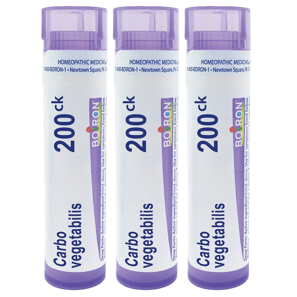 Boiron Carbo Vegetabilis pellets dissolving under tongue for quick, non-drowsy use.