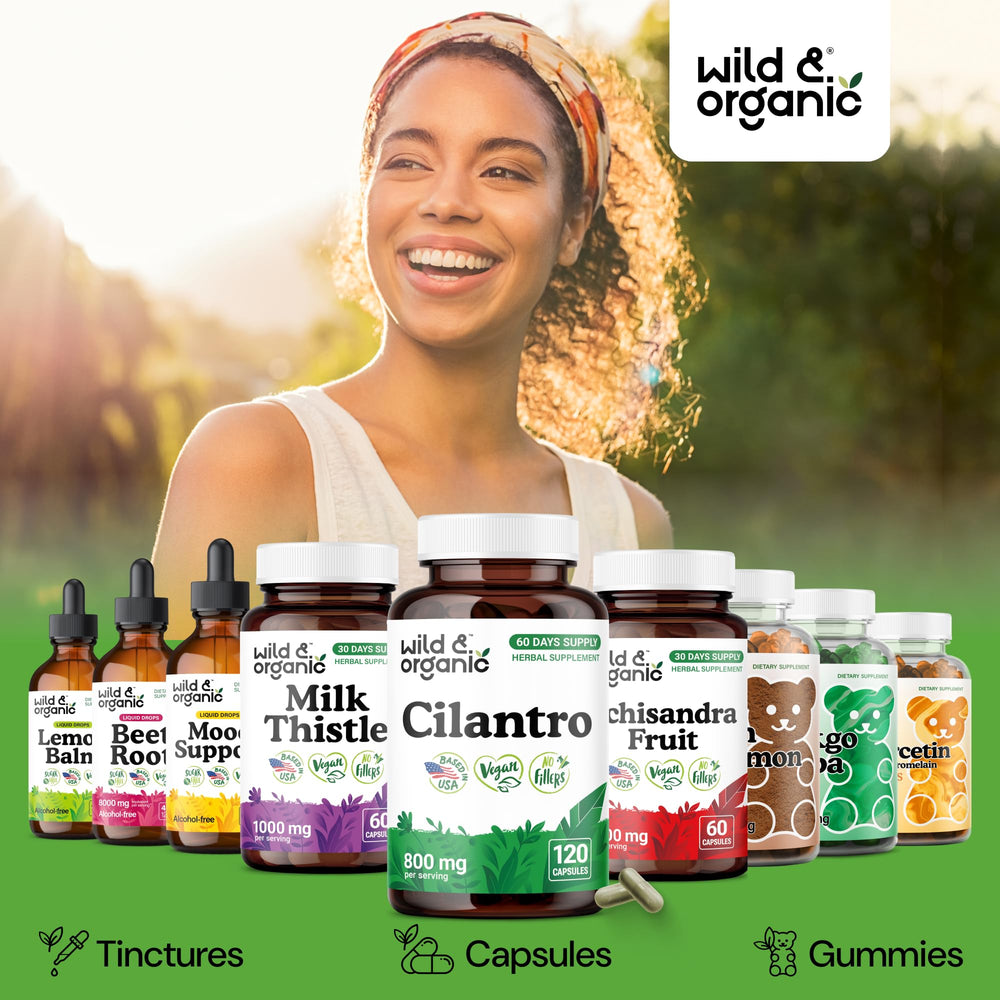 Bottle side view of Wild & Organic cilantro capsules in kitchen setting.