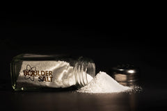 Boulder Salt contains calcium and magnesium particles that dissolve in the drink.