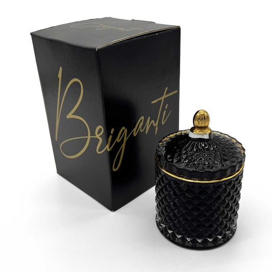 BRIGANTI Coconut Island candle in a black glass jar adds elegant ambiance to any room.