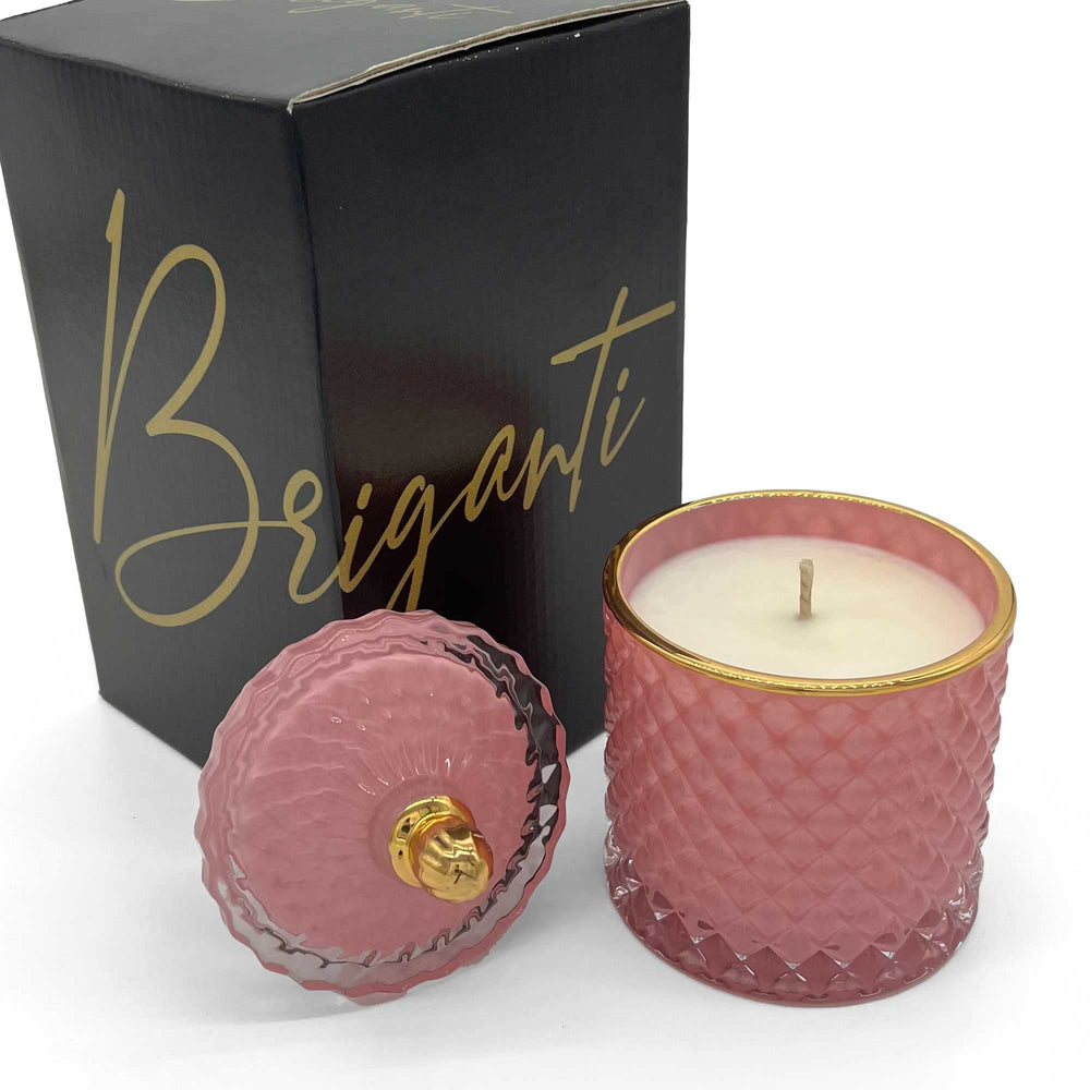 BRIGANTI Coconut Island pink glass jar with gold trim for calming ambiance.