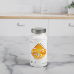 BrocElite BerbElite bottle beside a water glass for daily use