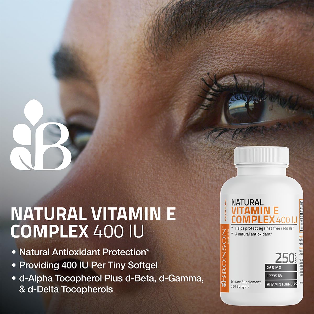 Bronson Vitamin E Complex softgel pour showing small, easy-to-swallow capsules.
