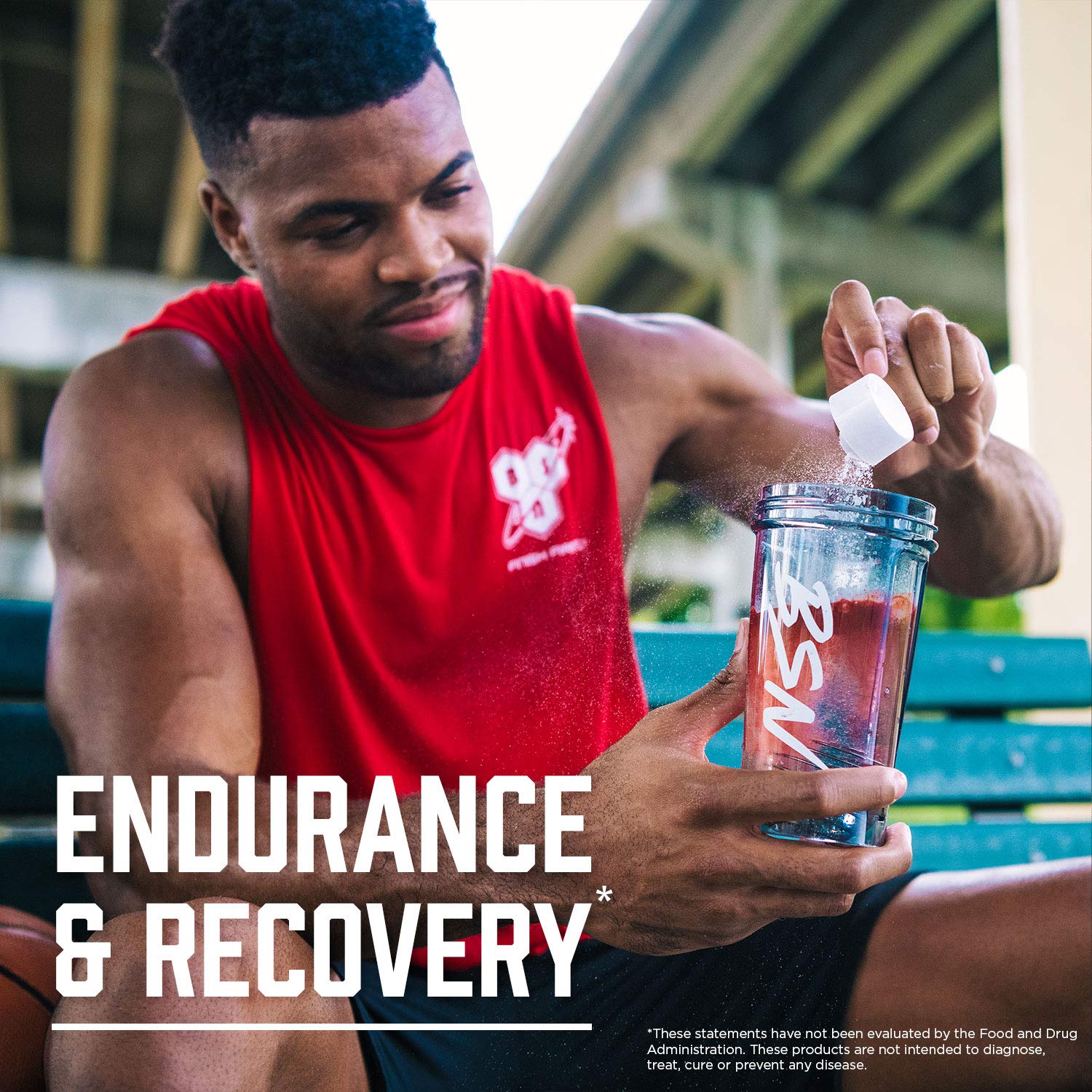 Athlete preparing BSN AMINO X before a workout for endurance