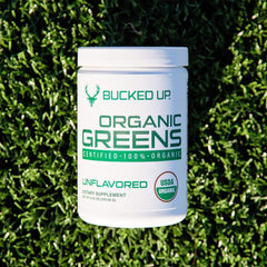 Bucked Up Greens Unflavored water-mix poured into a glass for a quick veggie boost.