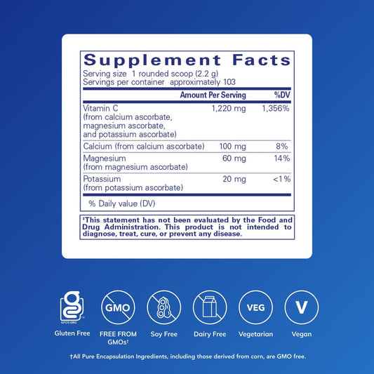 Buffered ascorbic acid powder closeup with measuring scoop for precise dosing.