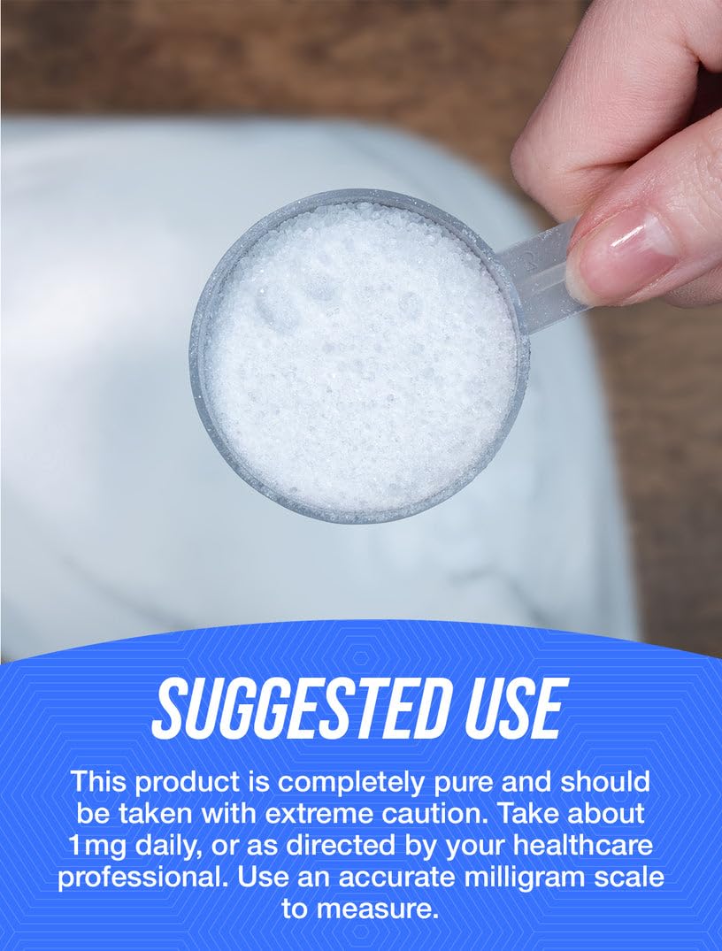 BulkSupplements Biotin powder dispensing scoop shows accurate serving measurement.