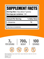 BulkSupplements scoop with sour green apple powder showing texture and dose
