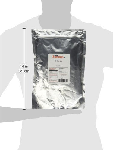 BulkSupplements L-Serine powder poured into a shaker for easy mixing.
