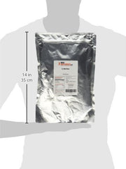 BulkSupplements L-Serine powder poured into a shaker for easy mixing.