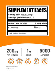 BulkSupplements L-Theanine powder being poured into glass, easy to mix with beverages.