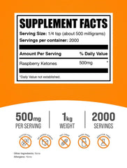 BulkSupplements Raspberry Ketones scoop beside measuring cup for simple mixing.