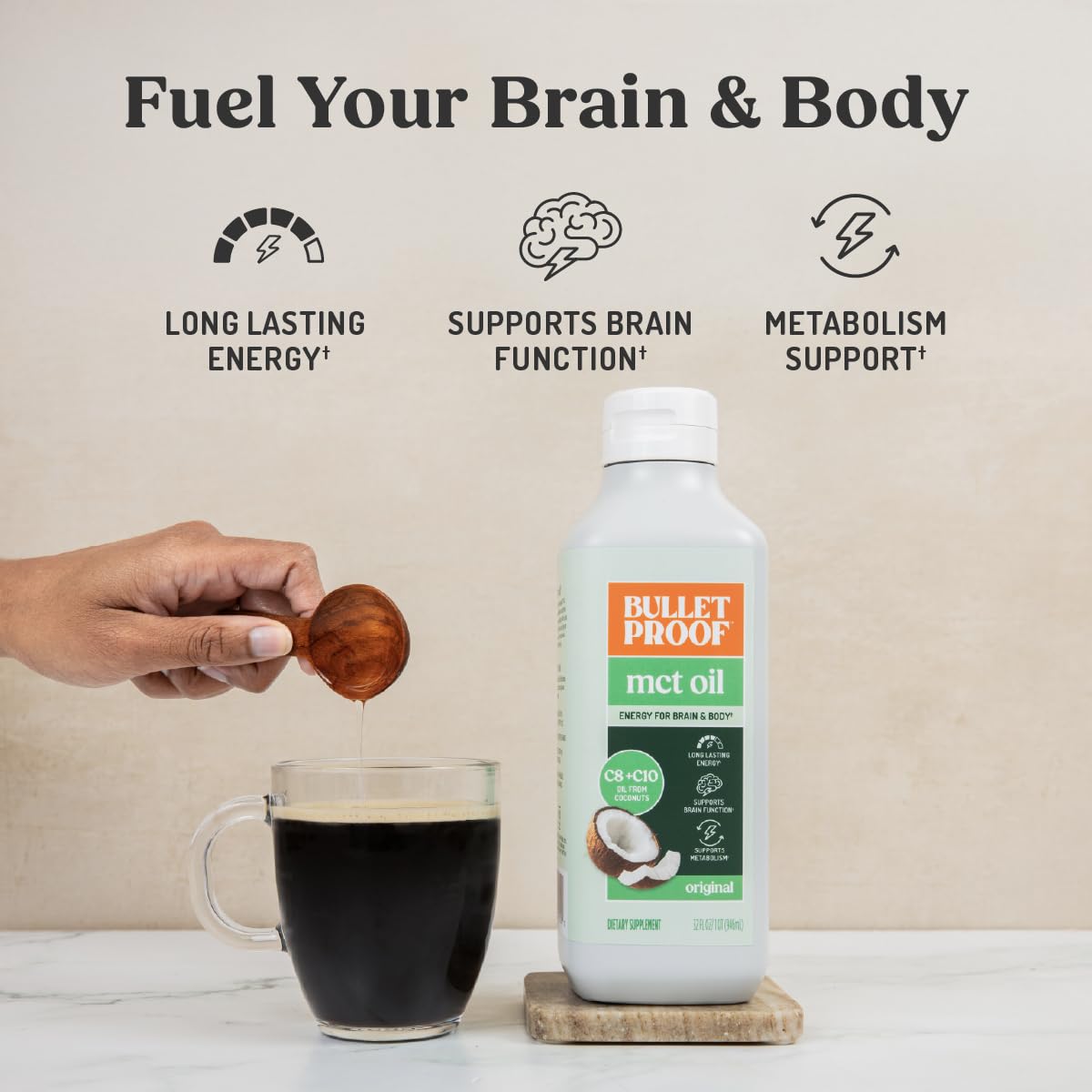 Bulletproof MCT Oil being poured into a cup for easy energy.