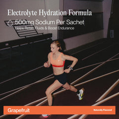 Cadence Race Energy Grapefruit carton on shelf highlighting vegan and keto-friendly formula.