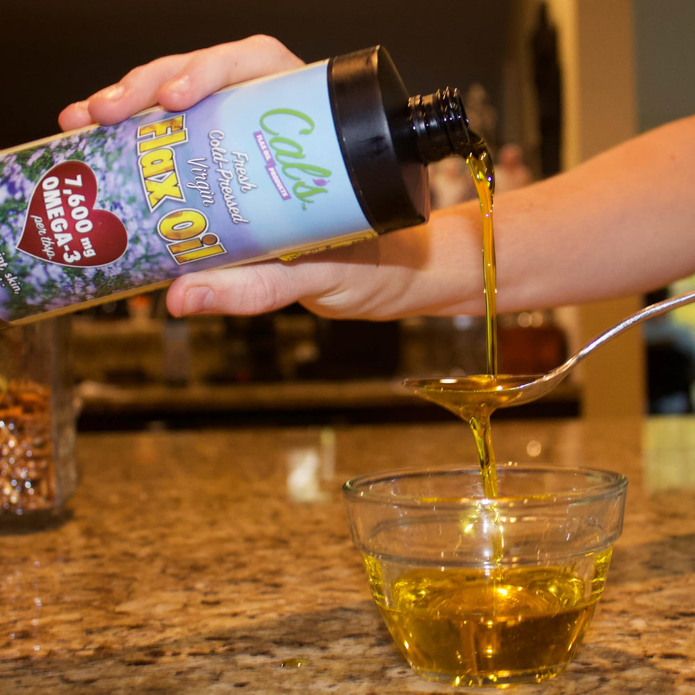Cal's Flax Oil label close-up shows non-GMO and gluten-free quality.