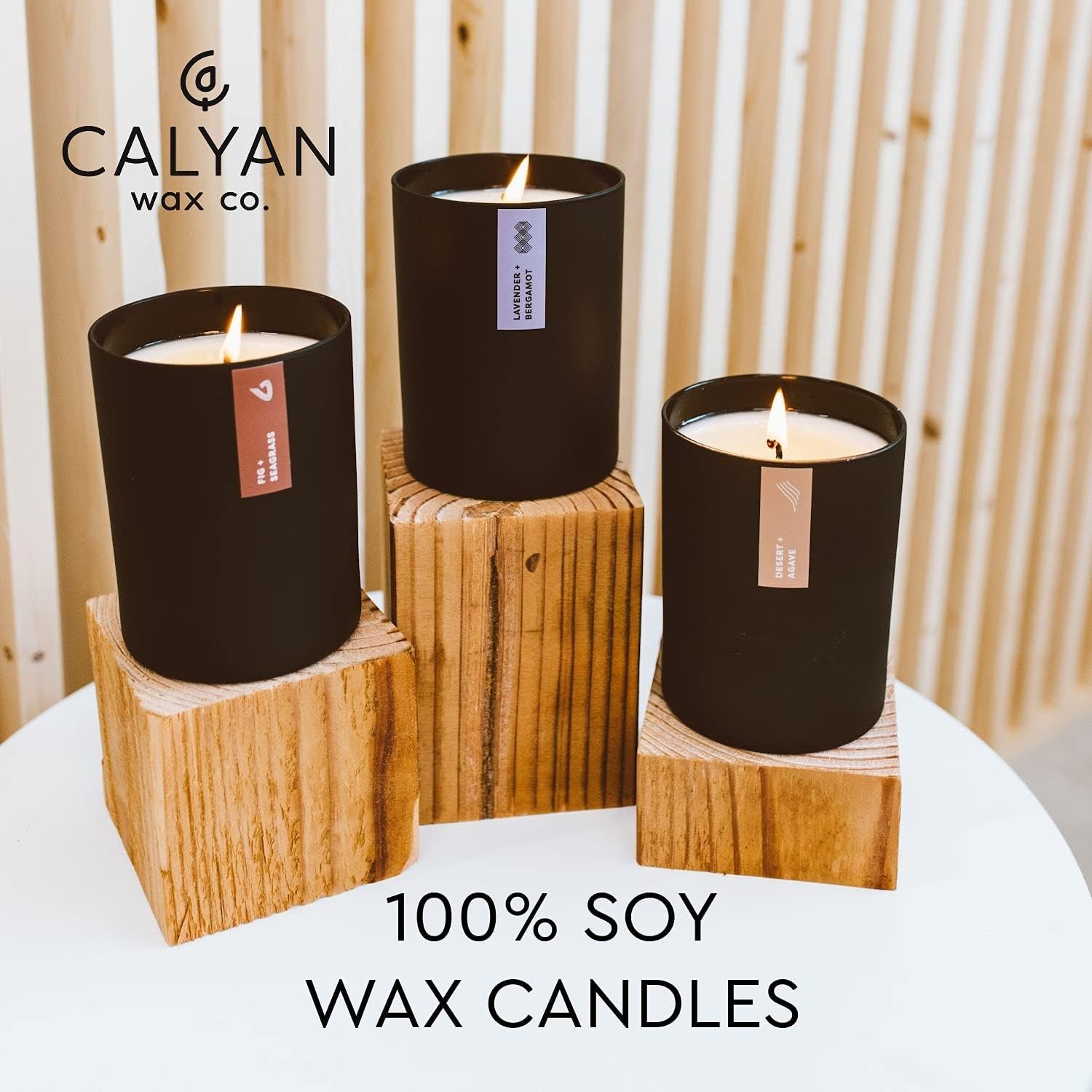 Calyan Oakmoss Amber candle label closeup shows luxury design