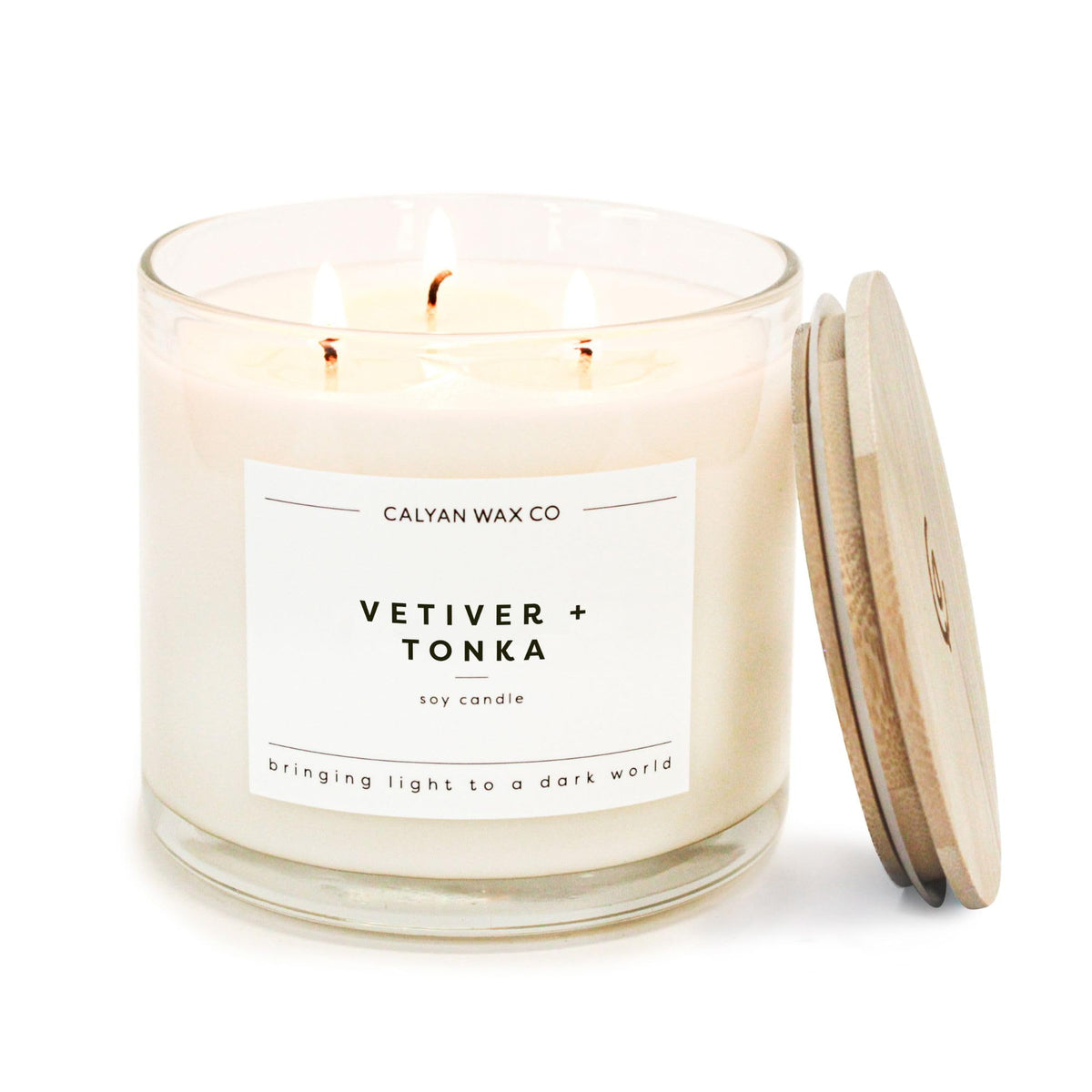 Calyan Wax Co Vetiver & Tonka 3 Wick candle in a 14.9oz jar for immersive fragrance.