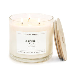 Calyan Wax Co. Aspen & Fog 3-wick candle in glass jar for long-lasting ambiance.