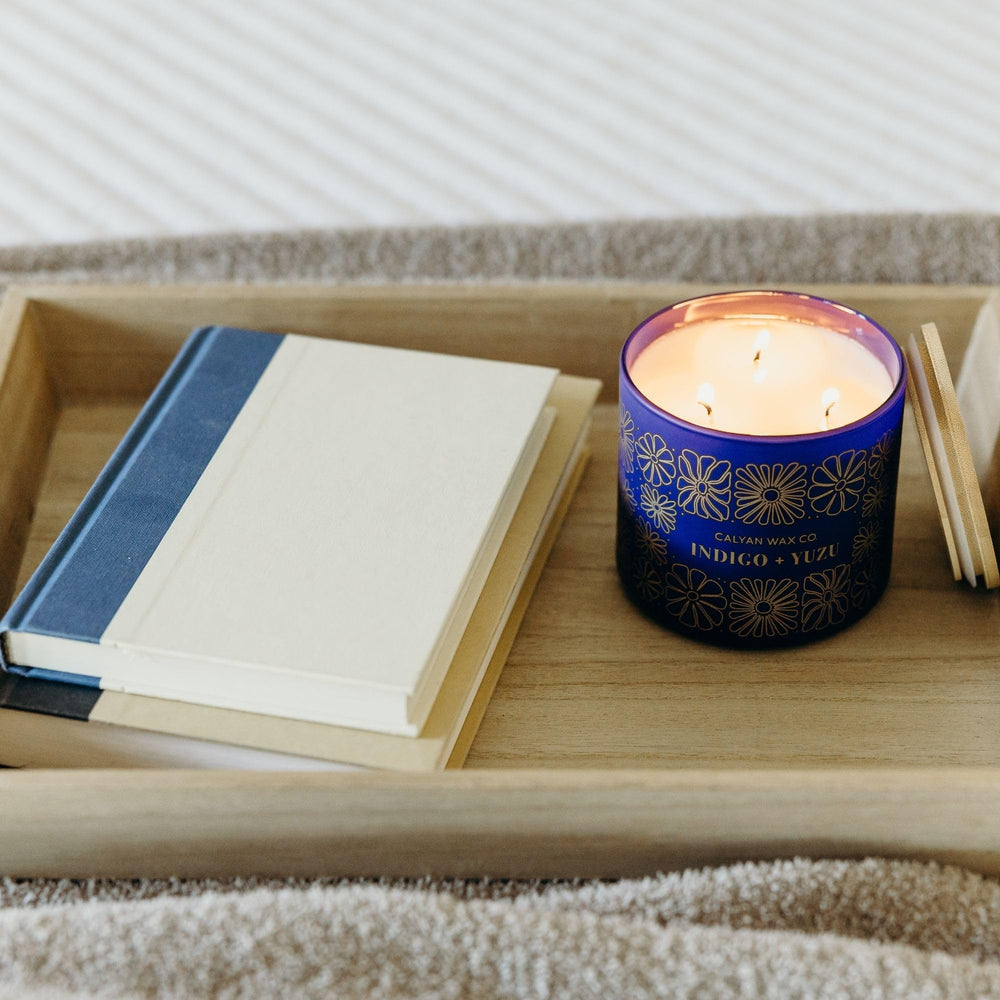 Fragrance notes blend bright yuzu and grapefruit with a deep indigo mood