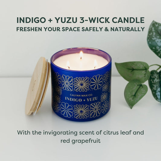 Close-up of Indigo and Yuzu wax showing triple-wick setup for even fragrance release
