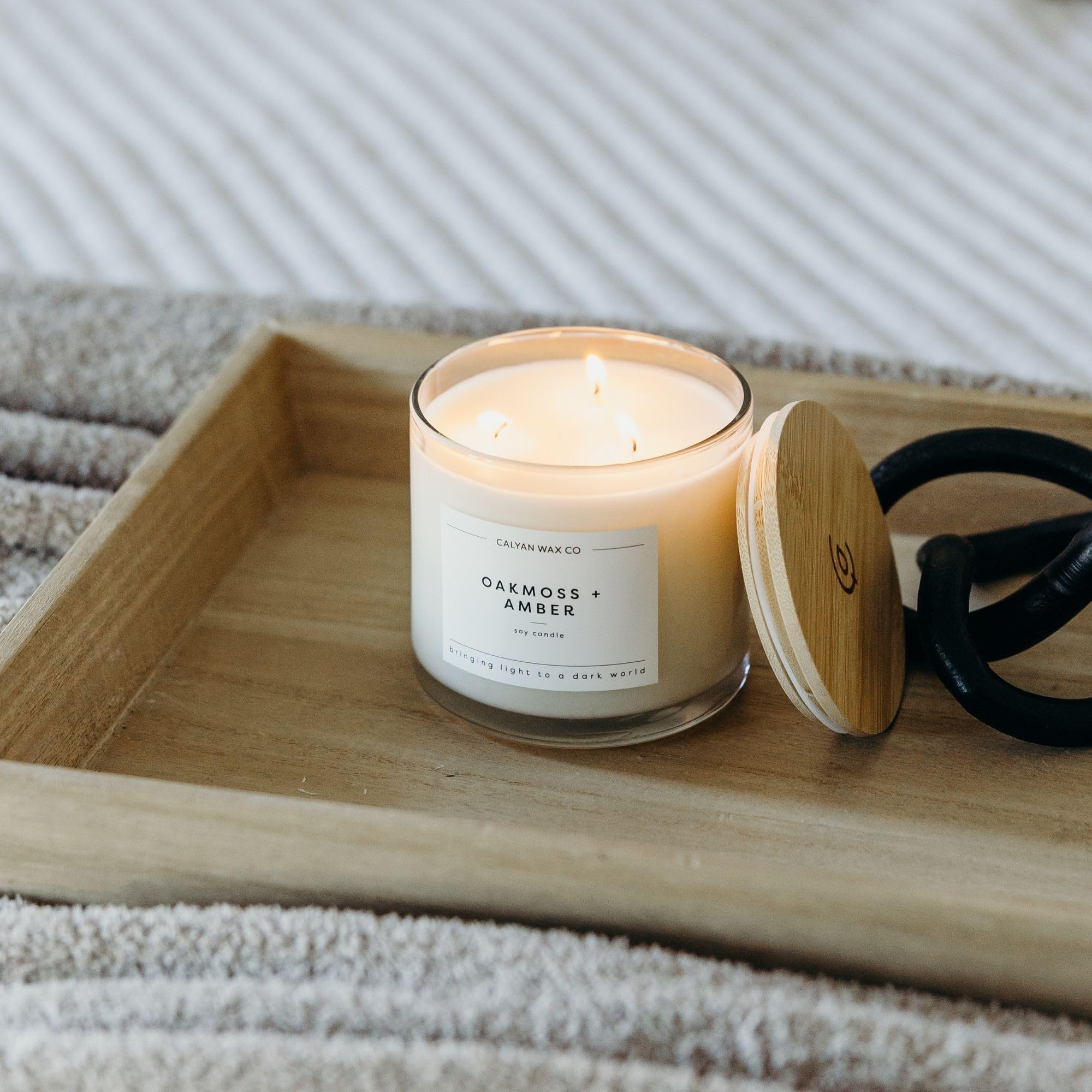 Calyan Wax Co. Oakmoss and Amber enhances large bedroom ambiance