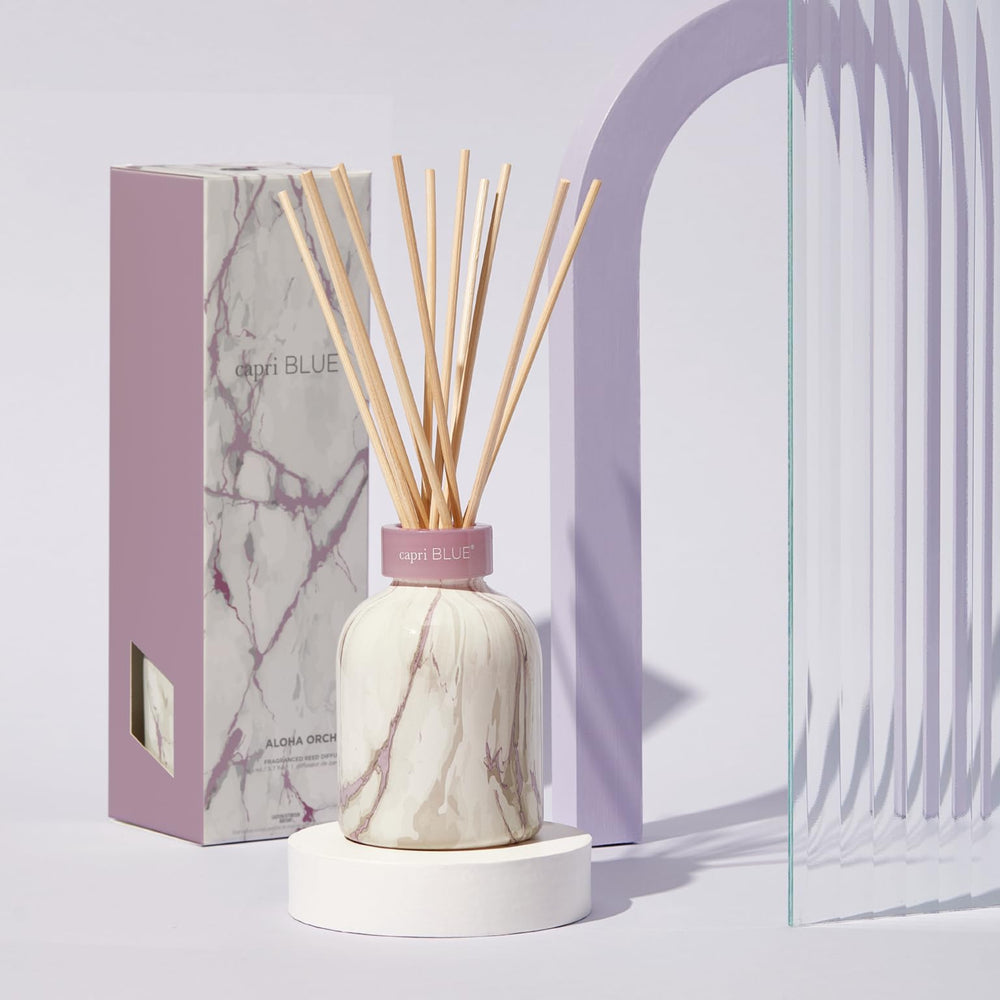 Capri Blue Modern Marble Diffuser bottle featuring Aloha Orchid scent