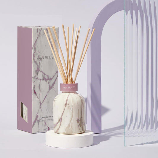 Capri Blue Modern Marble Diffuser bottle featuring Aloha Orchid scent