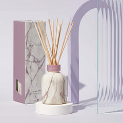 Capri Blue Modern Marble Diffuser bottle featuring Aloha Orchid scent