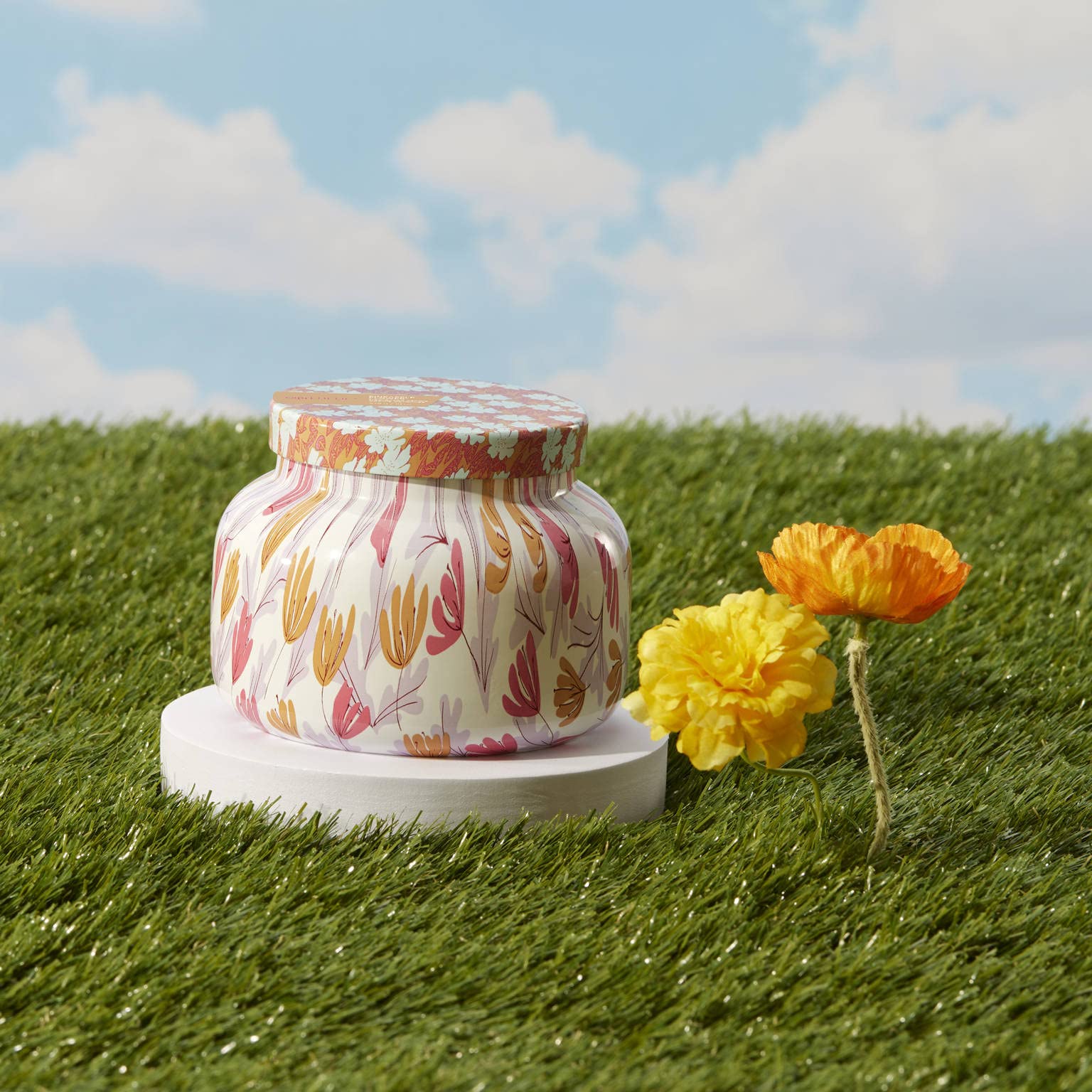 Capri Blue Pineapple Flower Pattern Play candle brightens rooms with uplifting fruit scent.