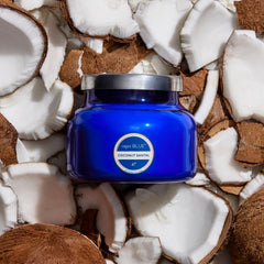 Blue jar candle glow from Capri Blue petite jar creates cozy ambiance.