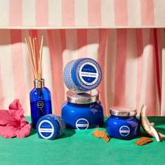 Gift-ready Capri Blue candle adds luxury to celebrations and decor.