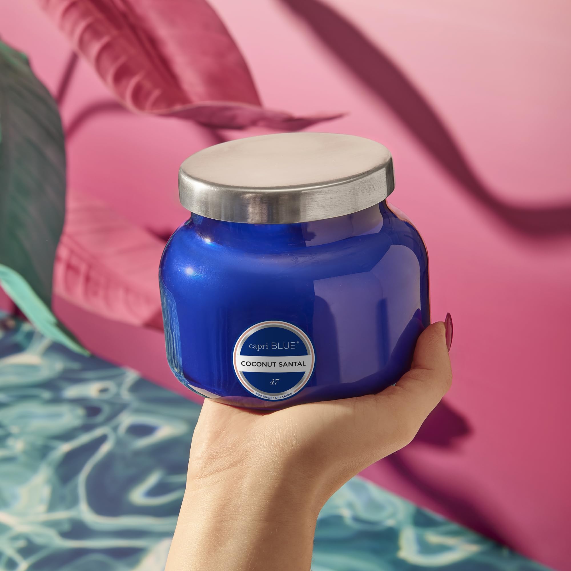 Close-up of Honeydew Crush wax in a blue Signature Jar showing vibrant color.