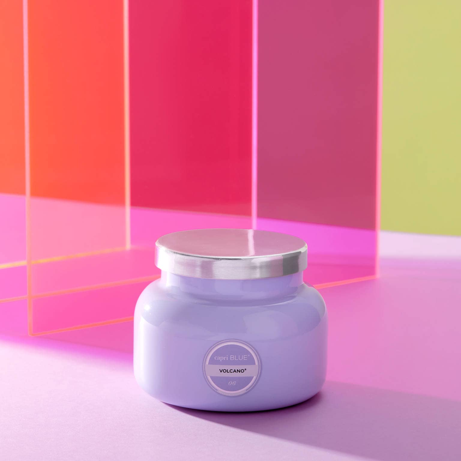 Capri Blue Volcano lavender jar with flame, signature scent elevating home ambiance.